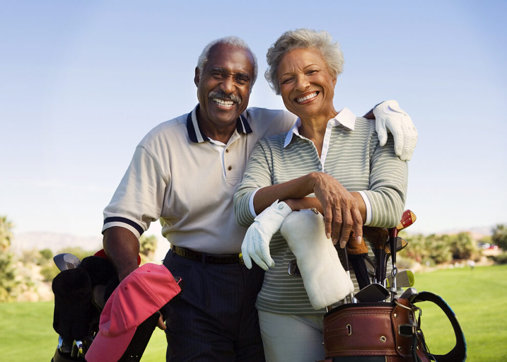 Happy couple on a golf course